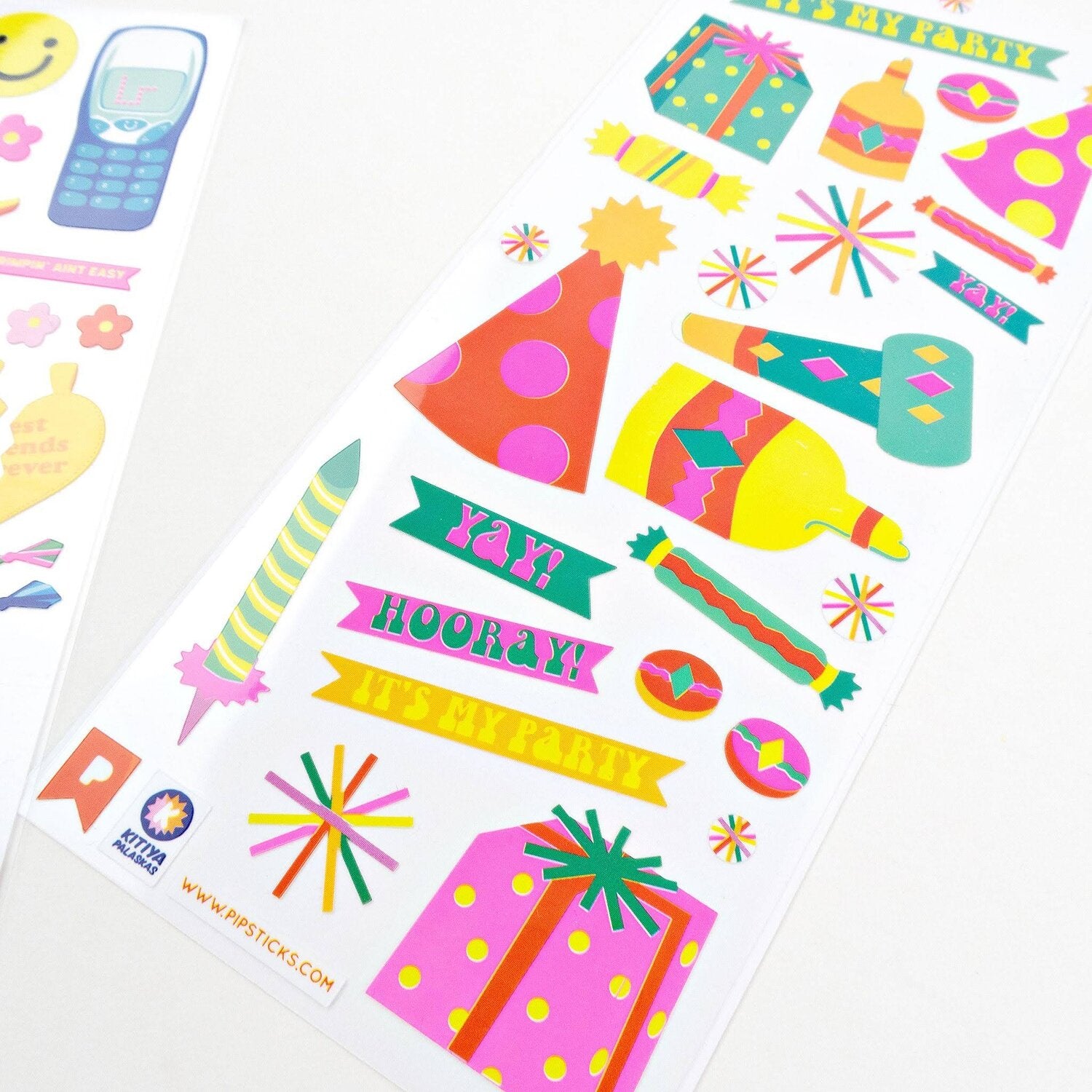 White rectangular sticker sheets featuring a collection of colourful, retro-inspired, illustrated motifs. 