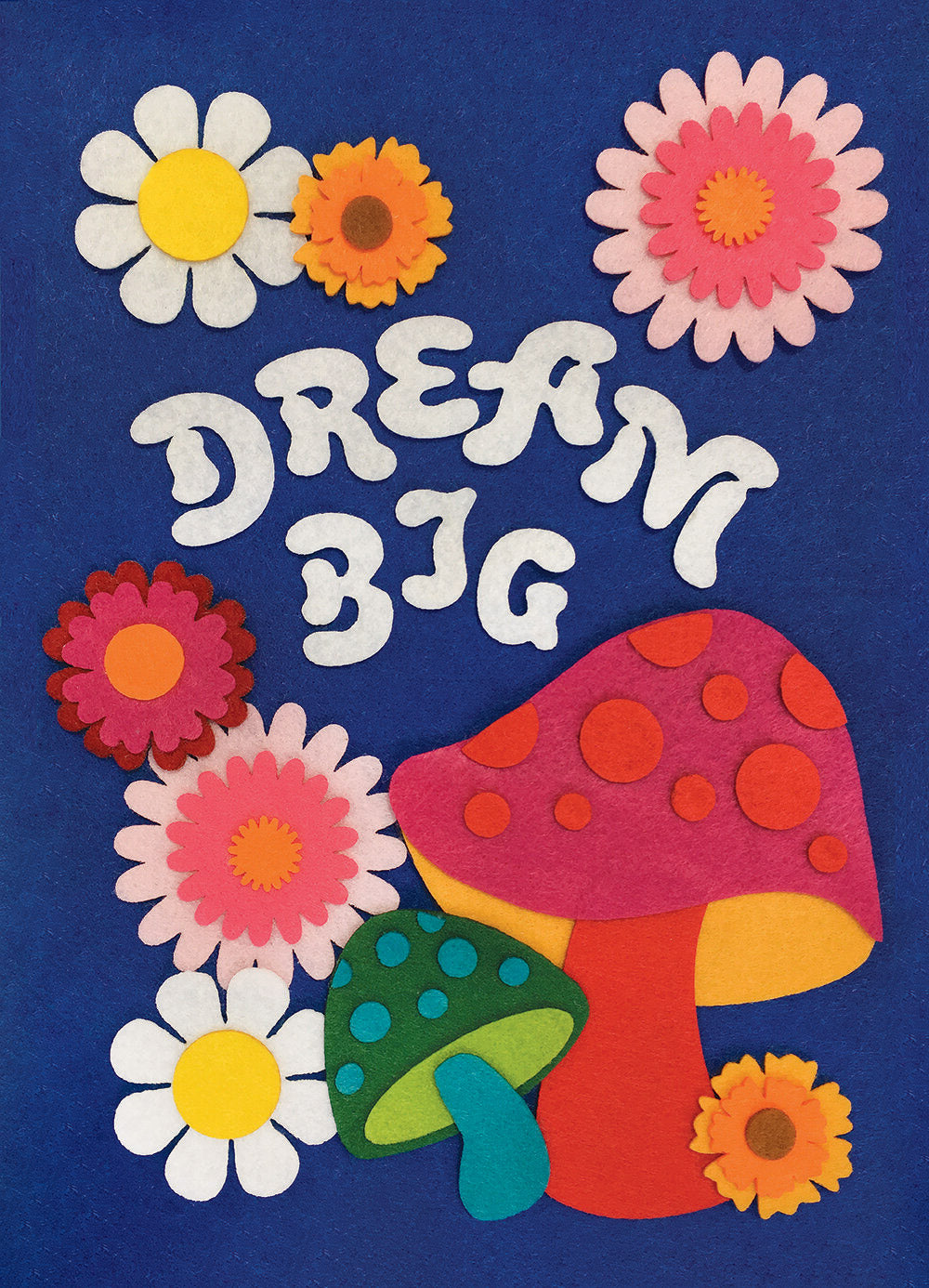 A felt collage illustration depicting a collection of colourful flowers and the words “Dream Big” in white retro-style text.